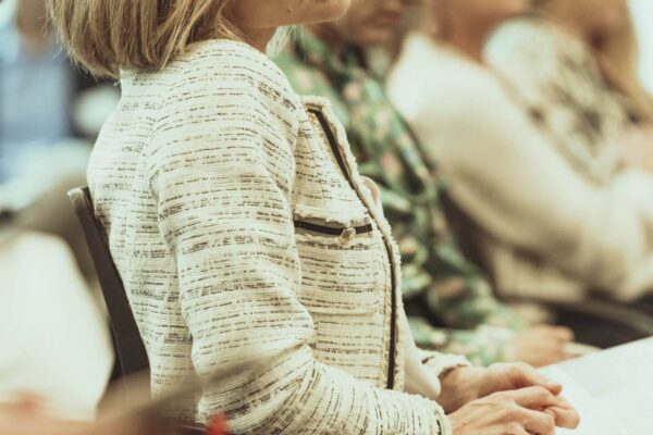 Photo shows audience member listening to the panel discussion at the MTM Forum at Sephora