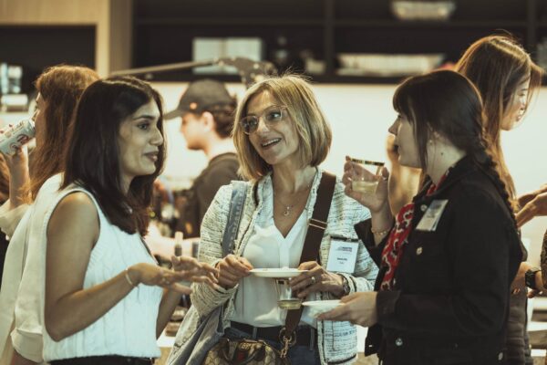 Photo shows attendees networking at the MTM Forum at Sephora