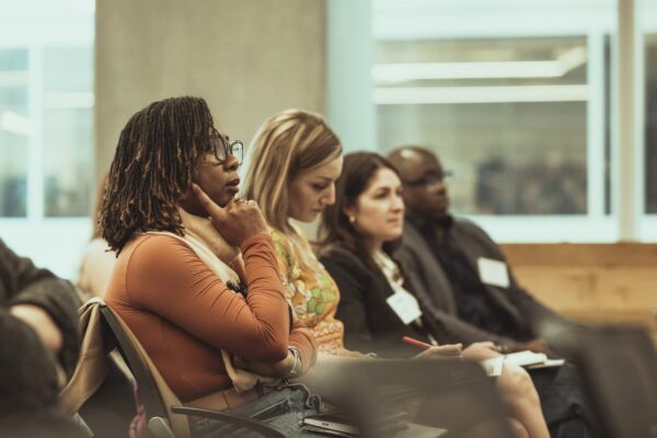 Photo shows audience members listening to the panel discussion at the MTM Forum at Sephora